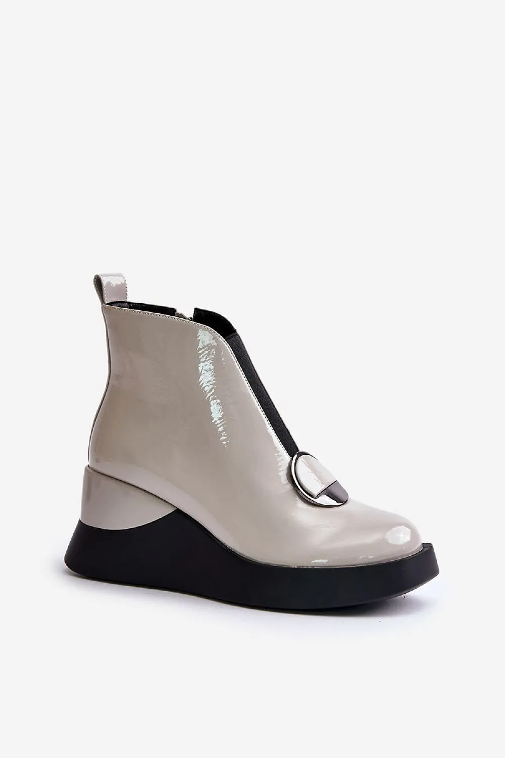 Elegant buskin boots set on a wedge